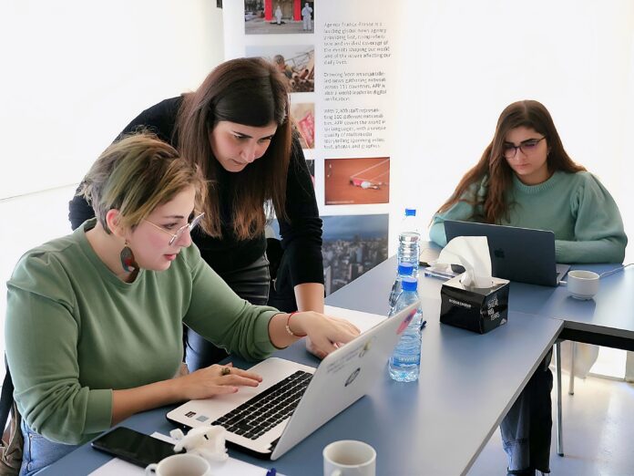 In the digital age, the newsroom is not only where stories are told—it is where bridges are built